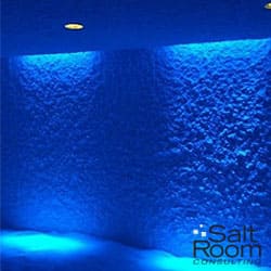 A view of a salt room wall with blue lighting